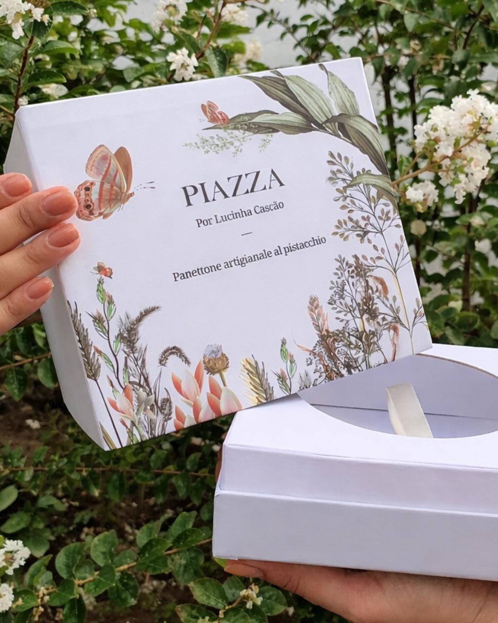 Caixa de fim de ano Piazza, com ilustrações botânicas e assinatura de Lucinha Cascão